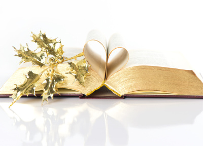 Vintage open book with golden pages