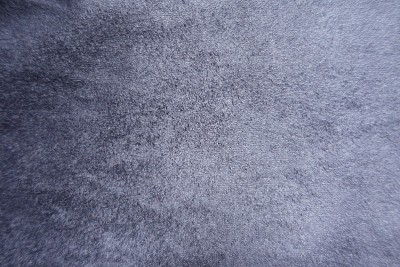 纯蓝色人造麂皮织物表面