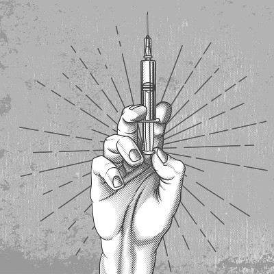 手拿注射器。