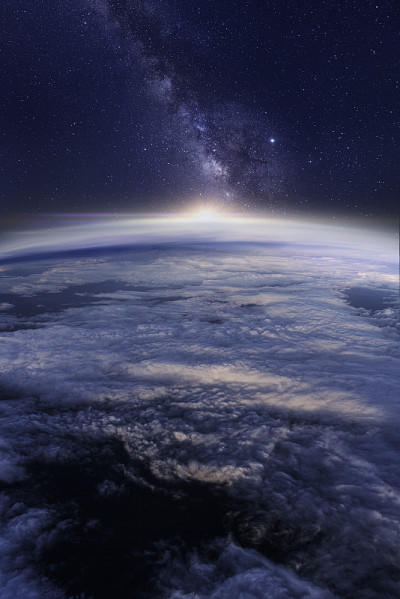Milky way rising over the Earth's horizon