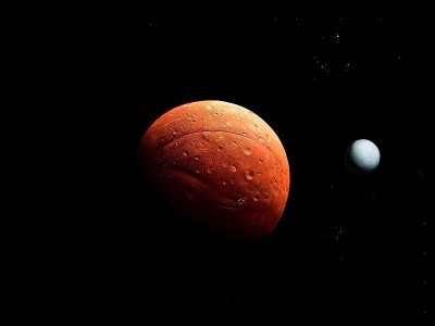 有固体表面、陨石坑和太空中大型卫星的红色星球