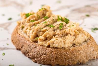 Bread slice with cream made from mashed chicken br