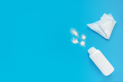 White powder, napkin on a blue background, flatley