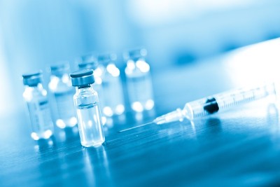 疫苗瓶剂量流感针剂针筒，医学概念接种疫苗皮下注射治疗疾病护理医院预防免疫疾病疾病婴儿背景。库存图片