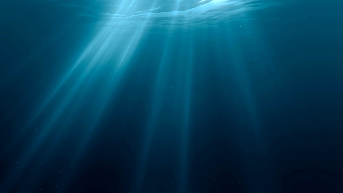 阳光穿过海洋表面。从水下观看。3D渲染的无缝循环动画。