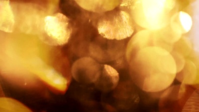 丰富的金光反射-闪亮的金光漏光效果与bokeh
