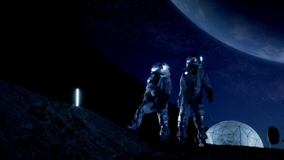 两个穿着太空服的宇航员站在月球上看着美丽的地球。在背景月球基地与测地线圆顶。月球殖民和太空旅行概念。