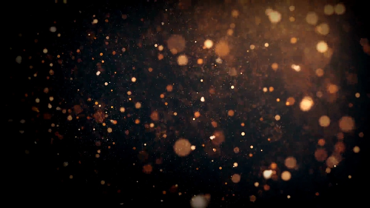 Dust Particles, random motion of particles.On beatiful relaxing Background. Glittering Particles With Bokeh in volumetric light