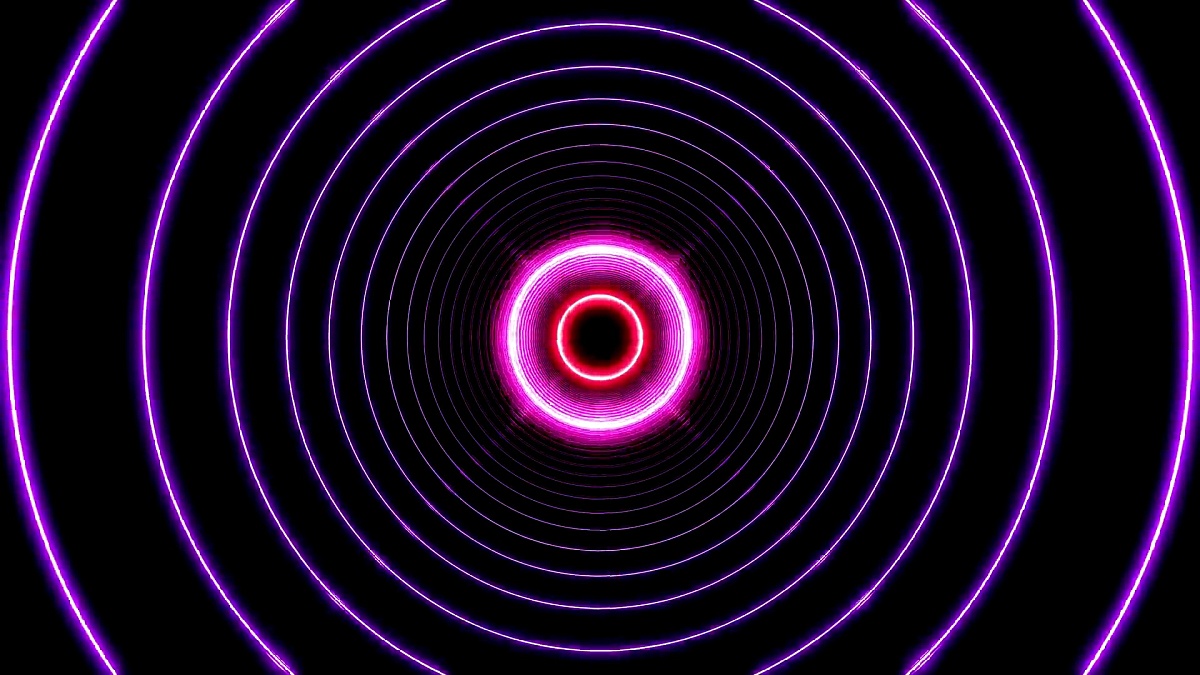 美丽的抽象圆形隧道与快速移动的轻轨。不同颜色的彩虹。飞过虫洞背景的未来隧道。循环3D动画艺术概念。