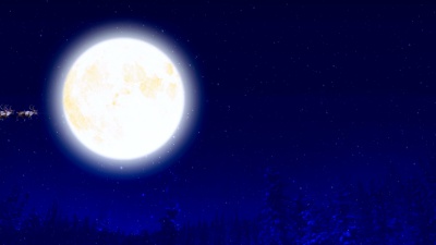圣诞前夕满月的圣诞老人 