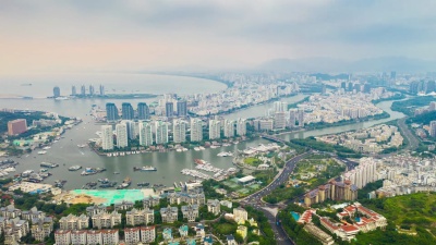 日落时间著名的三亚湾城市景观航空全景Timelapse   China