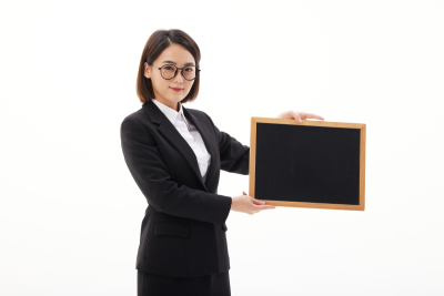人物系列职业女性双手拿着黑板