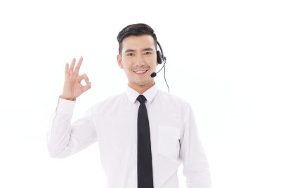 人物系列实景戴着耳机单手举起做ok手势的职业男性