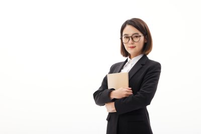 人物系列双手抱着课本的职业女性