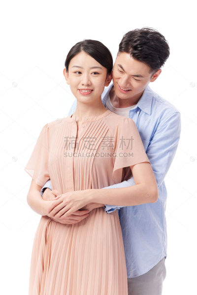 人物系列写实男人从背后抱住女人的腰