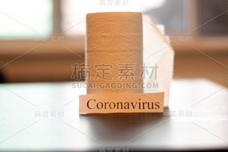 Coronavirus sign next to toilet paper. Theme of st