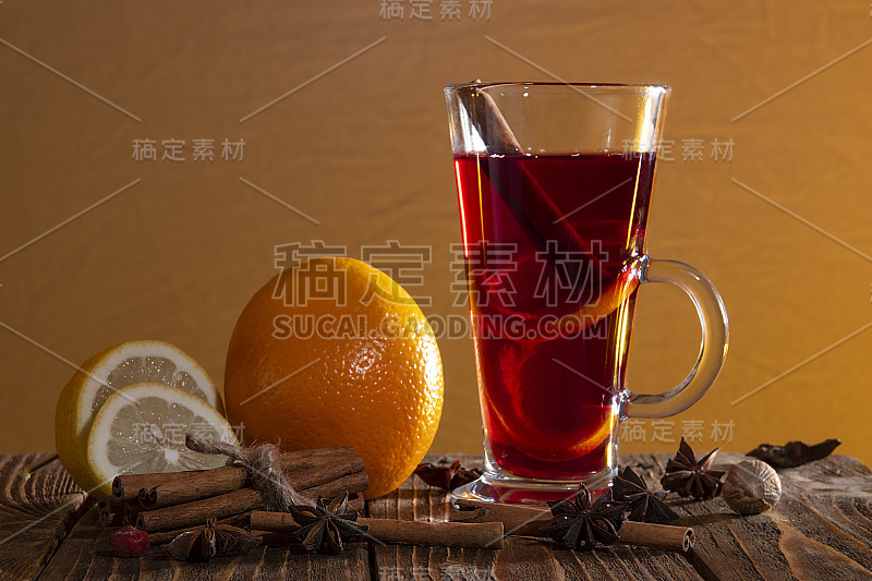 Mulled wine with orange peel, cinnamon sticks and 