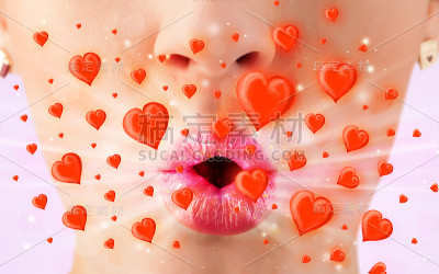 漂亮的女士嘴唇和可爱的红心