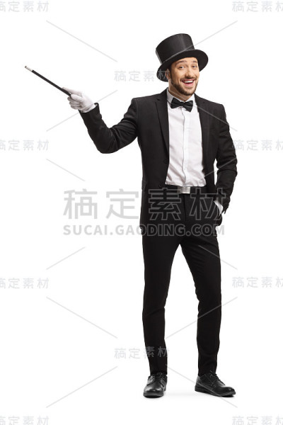 快乐的魔术师用魔棒指着微笑
