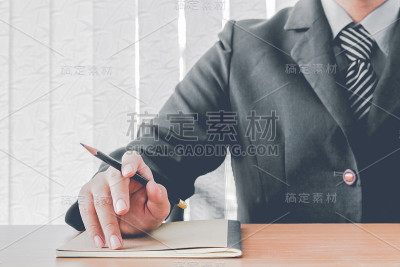 商人工作和握笔