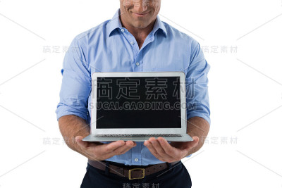 手持笔记本电脑的男性高管
