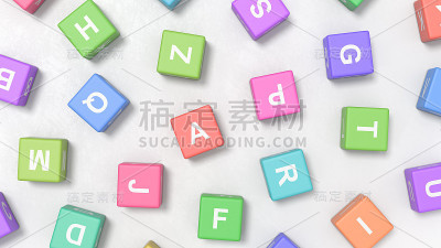 灰色背景上彩色立方体上的字母