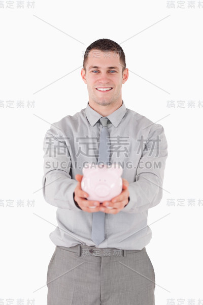 一个拿着存钱罐的商人的肖像