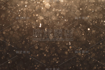 抽象的棕色散景背景。