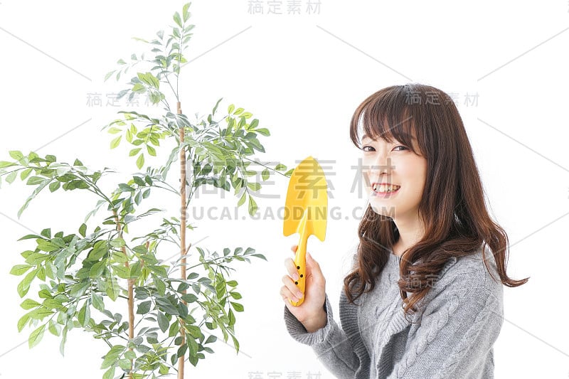 女人在种植花园