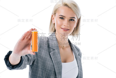 迷人的金发女商人拿着维他命