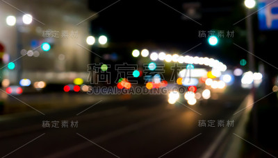夜间街道交通模糊的背景