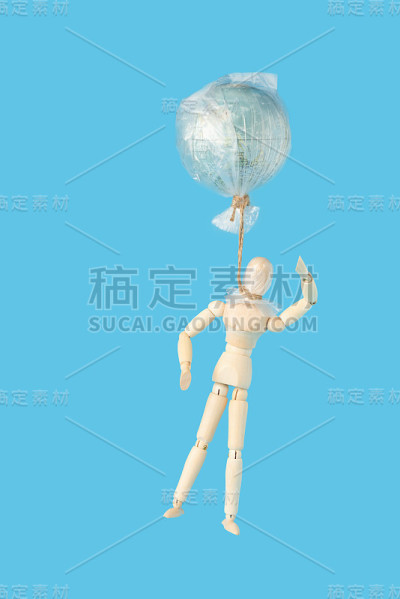 世界环境日的概念。象征木人和地球。环境污染的后果将是人类的死亡。