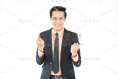 快乐的亚洲商人庆祝成功
