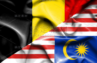 挥舞着马来西亚和比利时国旗