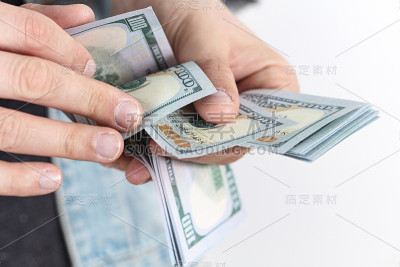 手数美元。商人，经济观念。