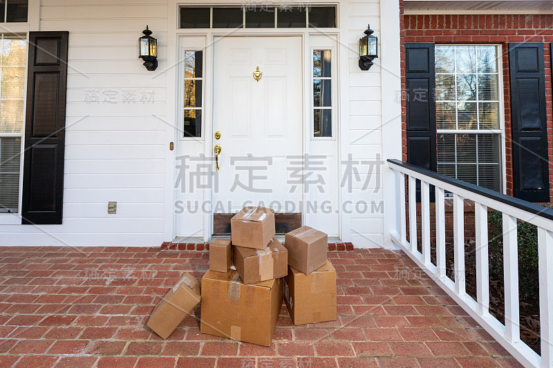 Shipping Boxes in front of door to home