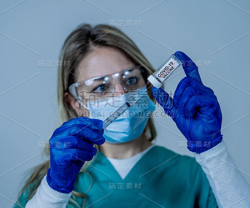 Doctor, nurse, scientist hand in blue gloves holdi