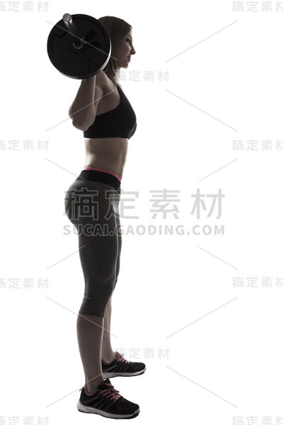 美丽的年轻女子肖像健身蹲