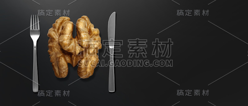 黑色背景上的核桃