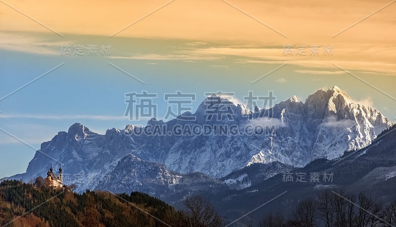 Winter landscape with small church and beautiful h