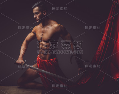 A man holding a sword.
