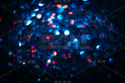 抽象模糊光散景，蓝色和红色。
