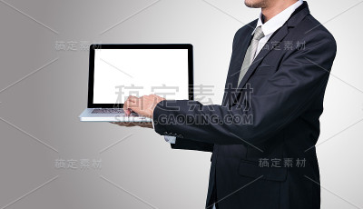 商人站立姿势手持笔记本电脑