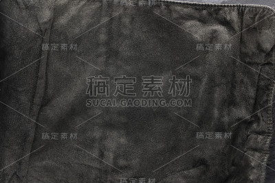 黑色结构背景-旧的破旧的时尚绒面革，背面，旧织物，纺织品