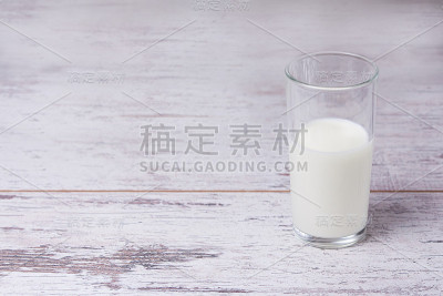 Glass milk. Glassware. Wooden table
