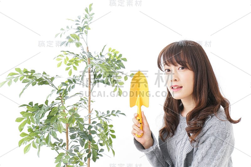 女人在种植花园