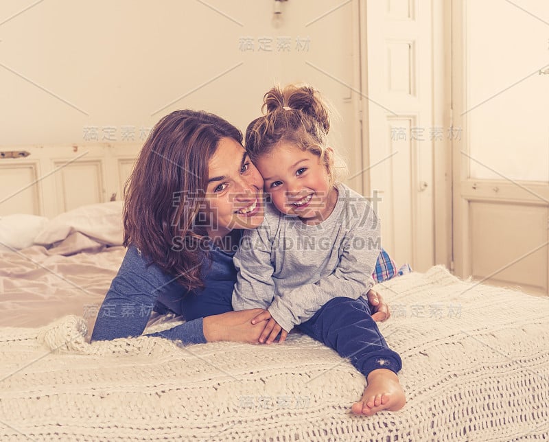 Lifestyle portrait of beautiful mother and daughte