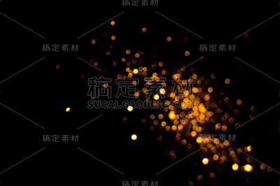 黑色背景上的金色抽象散景。