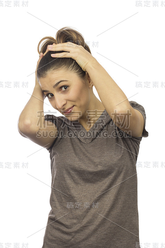 young woman with her hands on head