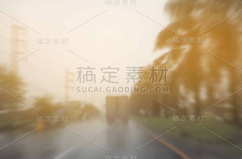 运动模糊的卡车在道路上的抽象背景。